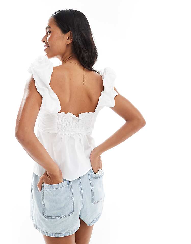 https://images.asos-media.com/products/asos-design-puff-sleeve-milkmaid-top-with-elasticated-back-in-white/206522414-2?$n_750w$&wid=750&fit=constrain