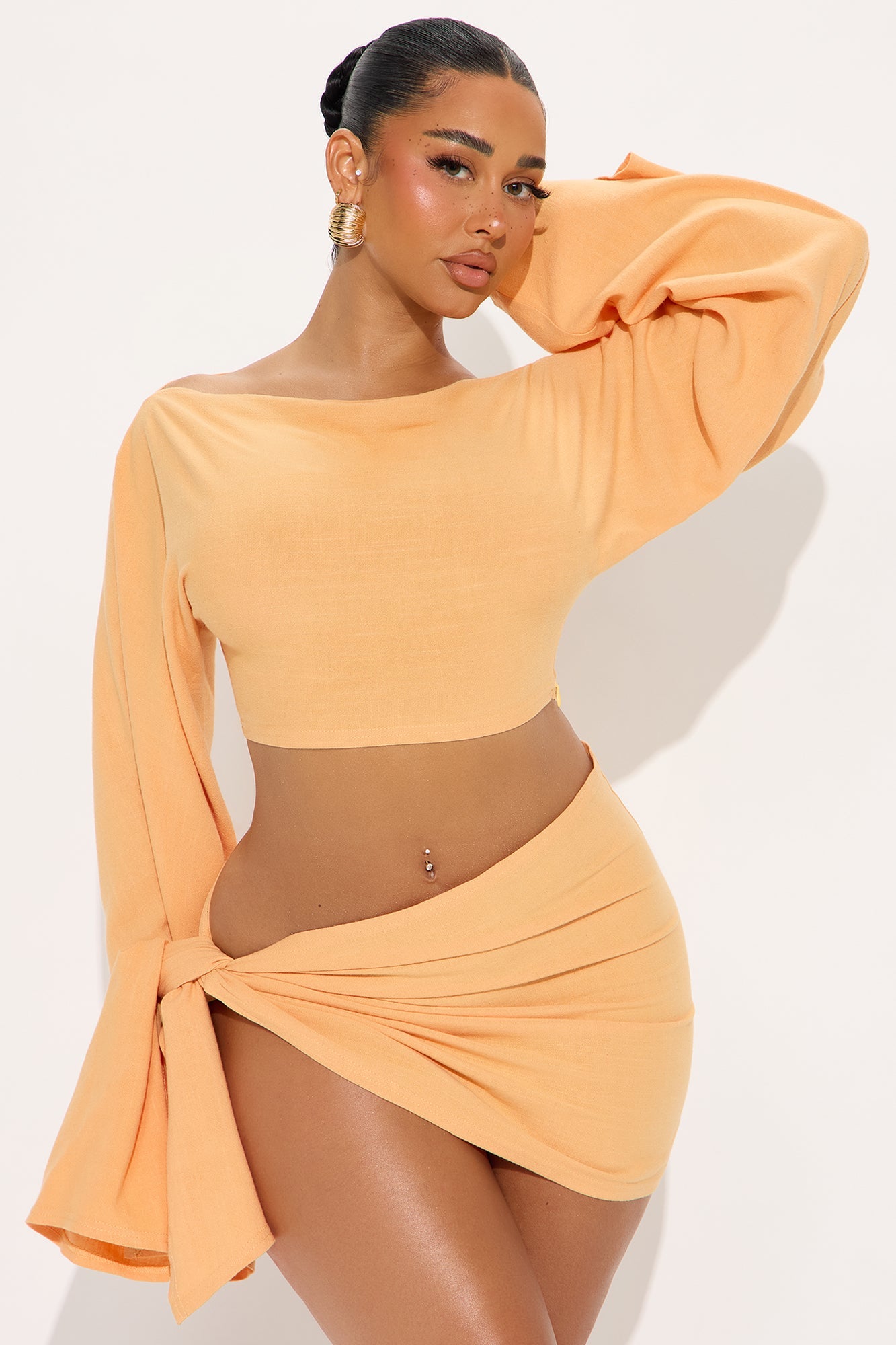https://cdn.shopify.com/s/files/1/0293/9277/files/04-16-25_S1_11_KSNM4080204_Peach_P_RK_SS_11-12-30_0170_PXF.jpg?v=1746226896