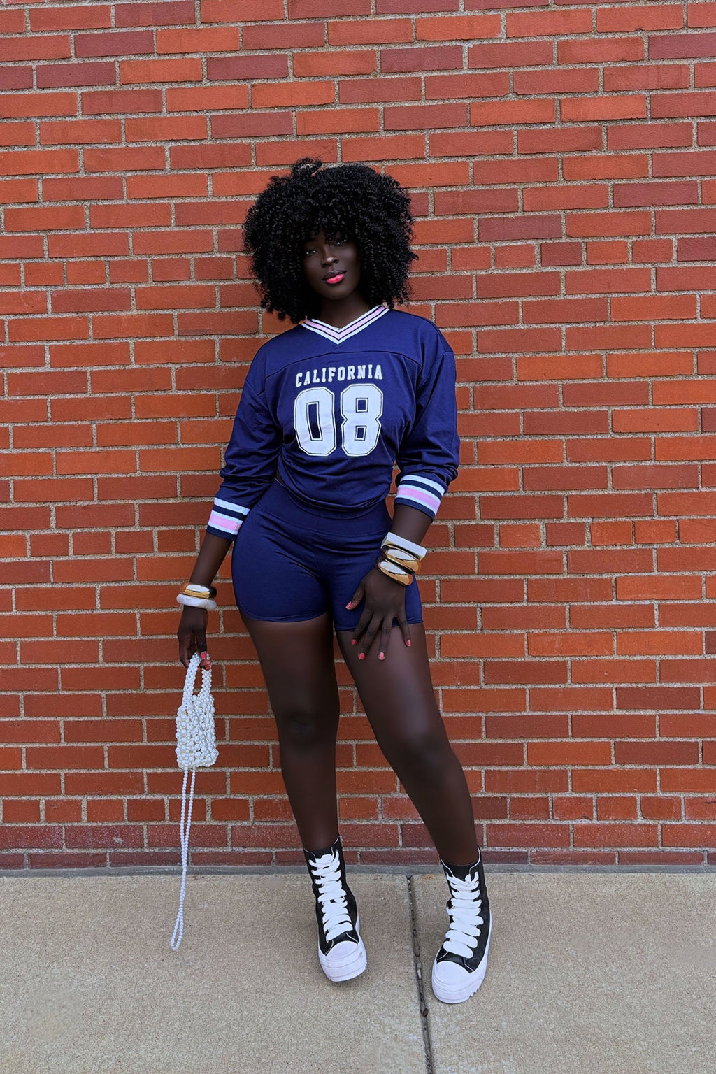 https://cdn.shopify.com/s/files/1/0293/9277/files/6-20-2024__286_08_Cali_Biker_Short_Set_Navy_combo_GF.jpg?v=1722550939